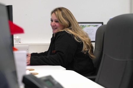 Cosy Homes Team Member At A Computer