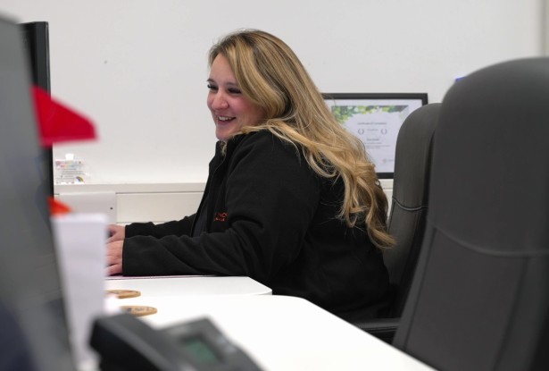 Cosy Homes Team Member At A Computer