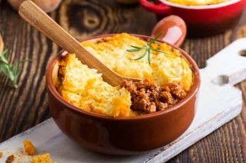 Casserole dish of cooked Cottage Pie