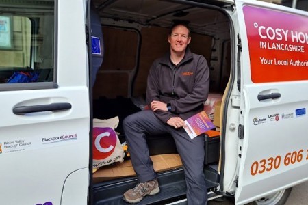 The Handy Person stood with the Little Van of Warm from Cosy Homes